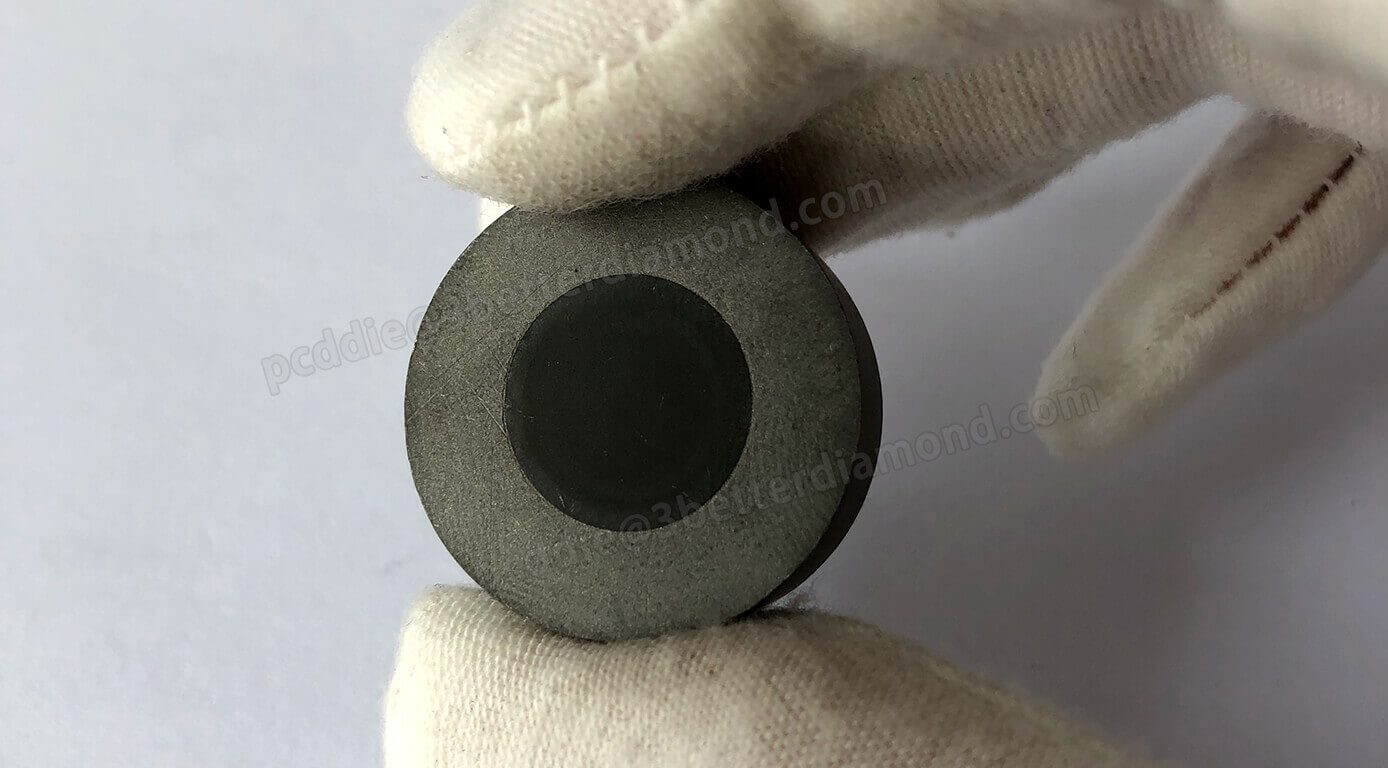Polycrystalline diamond wire drawing die blank with carbide support